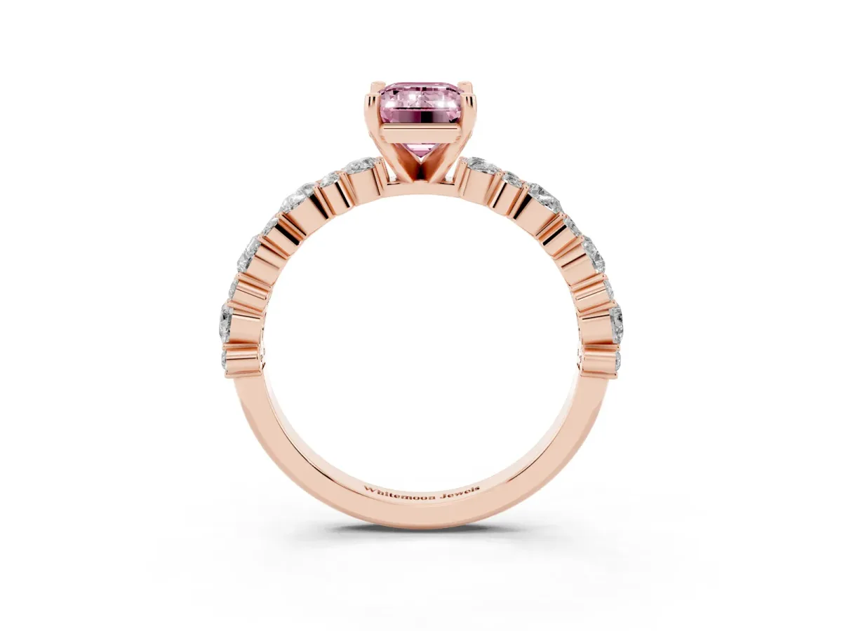 Fancy Pink Emerald Cut Diamond Side Stone Solitaire Ring with Round and Four-Prong Setting Rose gold