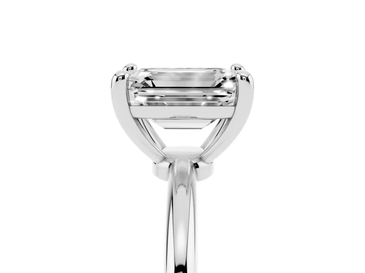 Emerald Cut Solitaire Diamond Ring with 4-Prong Setting on a Classic Band Silver