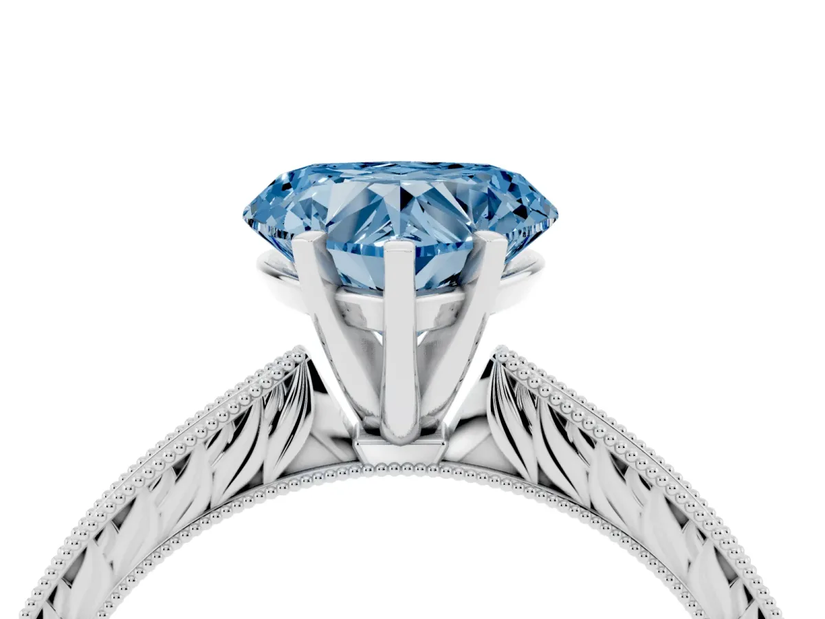 Fancy Blue Heart Cut Solitaire Milgrain Engraved Band with Four-Prong Setting Platinum