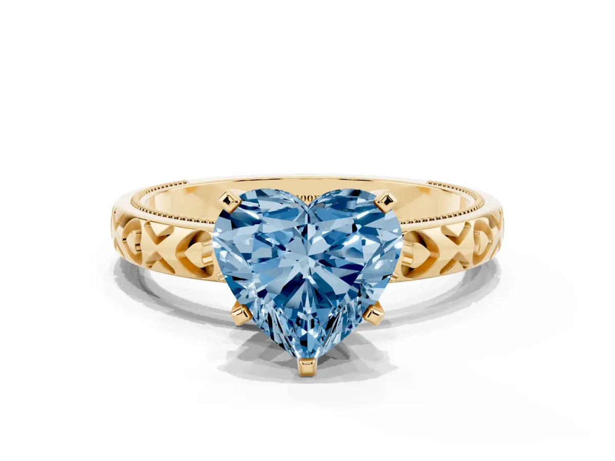 Fancy Blue Heart Cut Solitaire Diamond Engagement Ring with XO Engraved Band and Four-Prong Setting Yellow gold