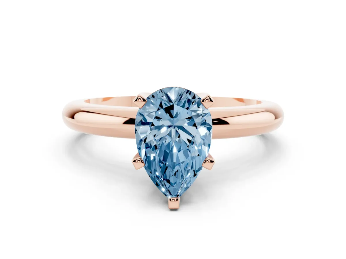 Fancy Blue Pear Cut Diamond Solitaire Engagement Ring with Round Band and Four-Prong Setting Rose gold