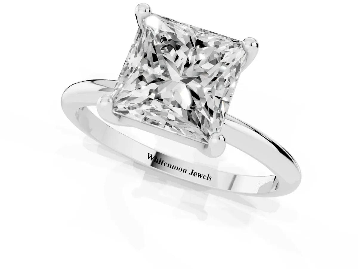 Princess Cut Solitaire Diamond Ring with 4-Prong Setting on a Classic Band Silver