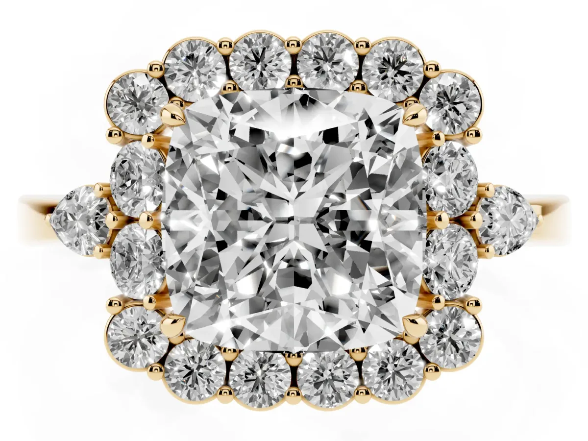 Cushion Cut Diamond Halo Ring with Pear Side Stones and Prong Setting Yellow gold