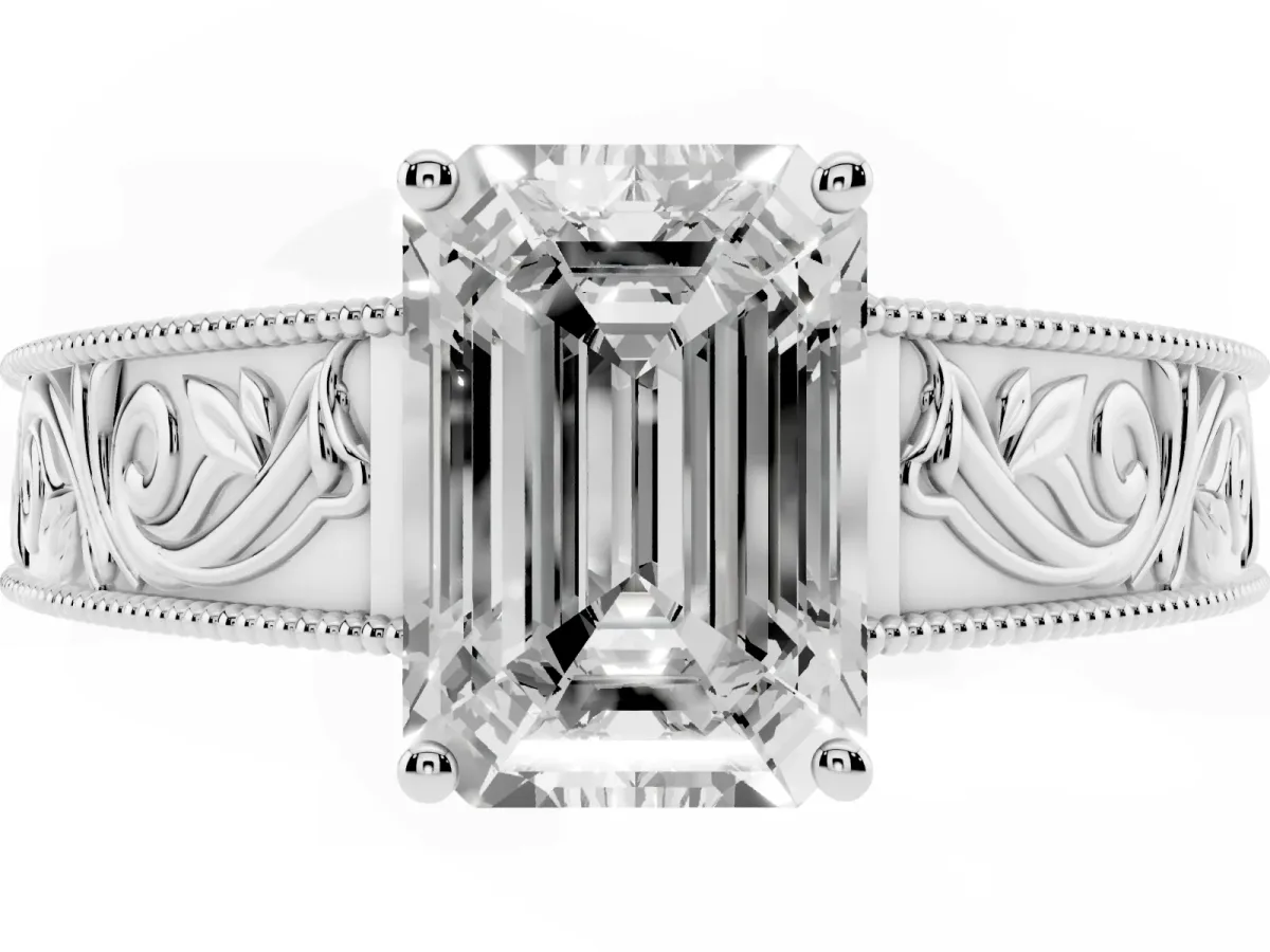Emerald Cut Diamond Solitaire Ring with Engraved Band and Four-Prong Setting Platinum