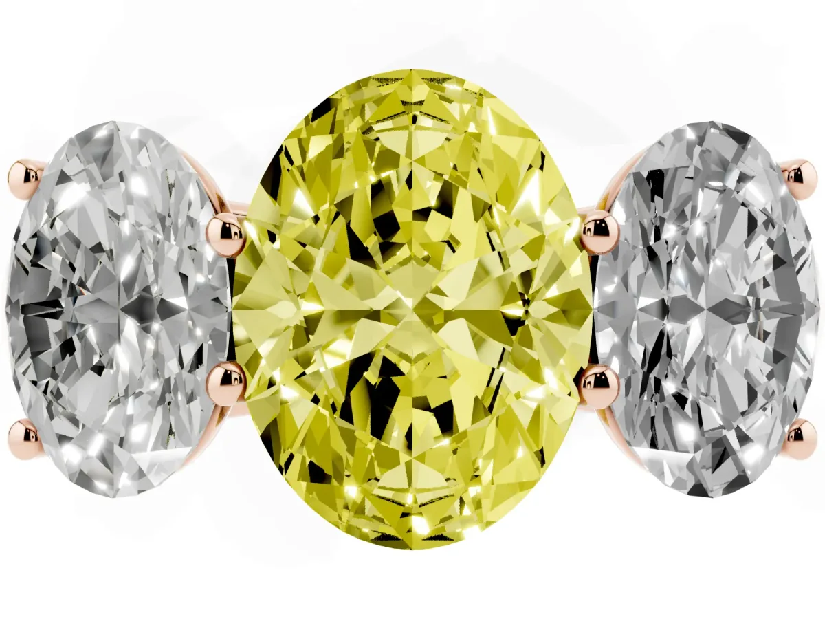 Fancy Yellow Oval Cut Three-Stone Diamond Ring with Prong Setting on a Classic Band Rose gold