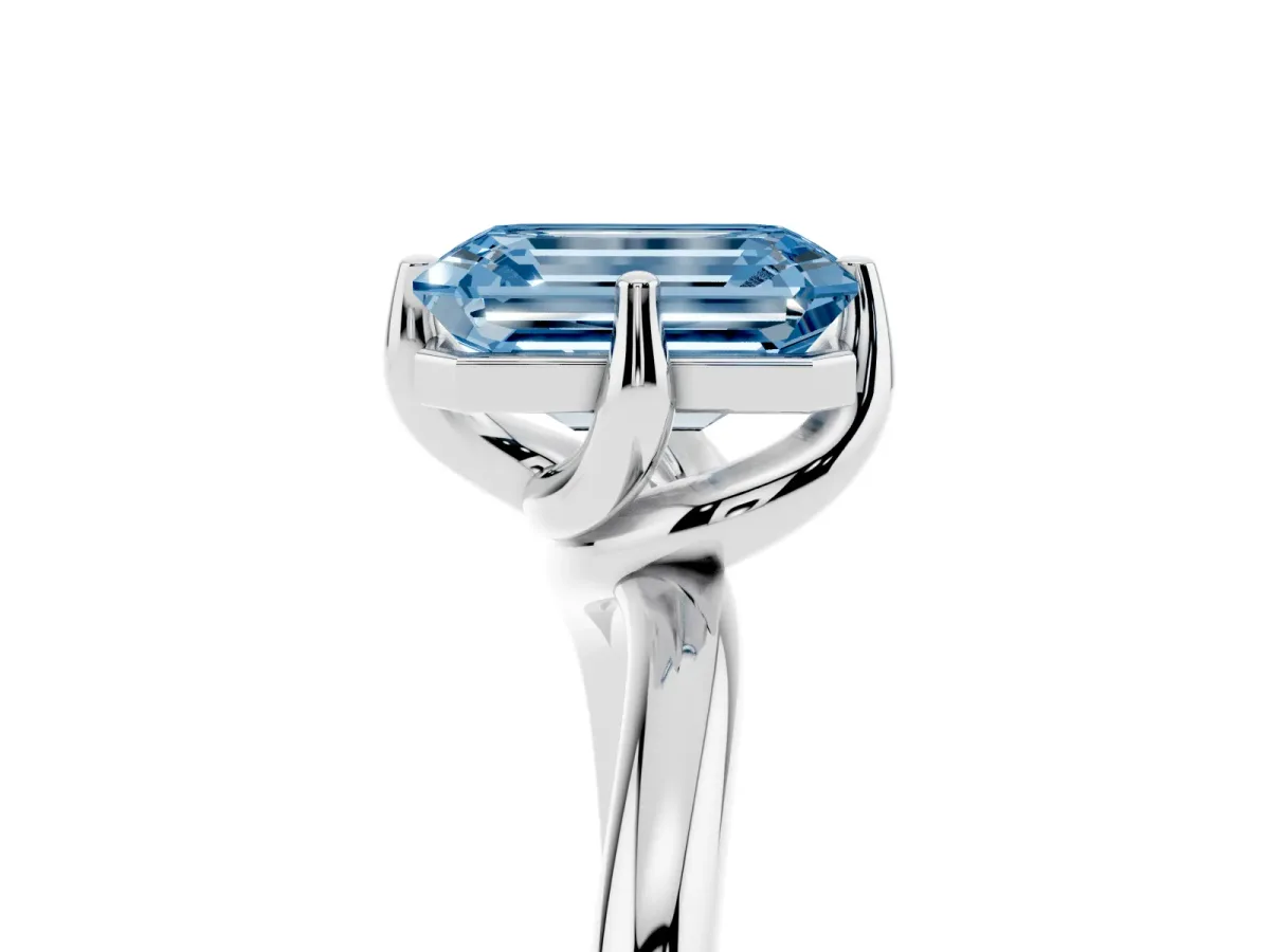Fancy Blue Emerald Cut Diamond Solitaire Engagement Ring with Four-Prong Setting and Classic Band Silver