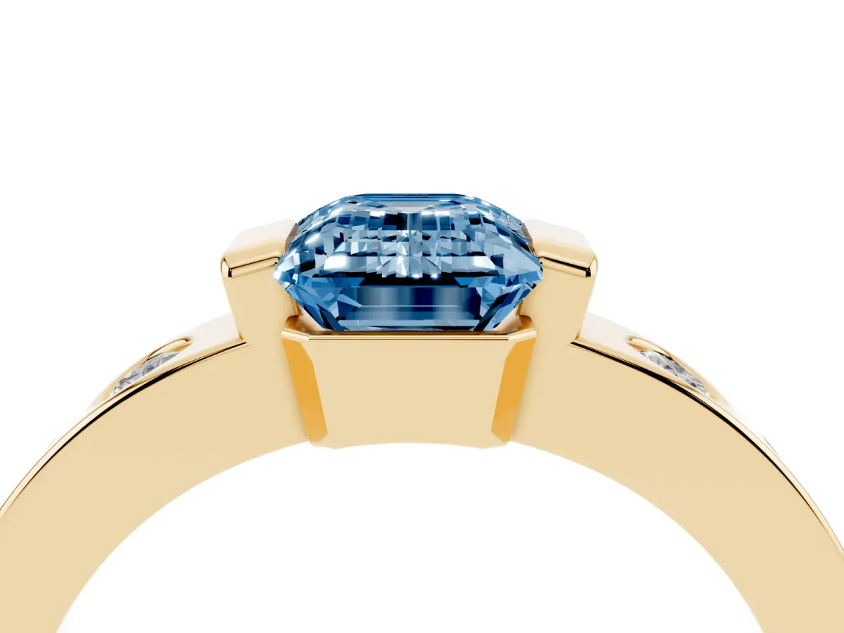 Fancy Blue Emerald Cut Brilliant Channel-Set Diamond Ring with Bezel Prong Setting Yellow gold