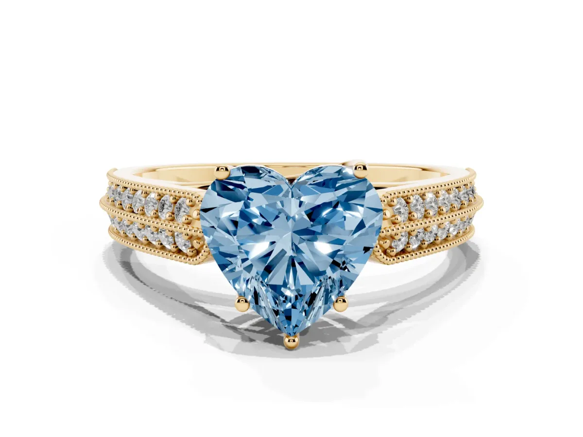 Fancy Blue Heart Cut Cut Pave Split Shank Engagement Ring with Four-Prong Setting Yellow gold