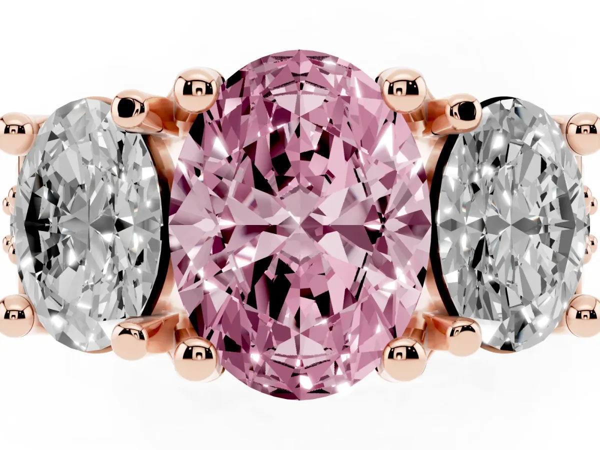 Fancy Pink Oval Cut Diamond Three-Stone Ring with Channel Set Band and Four-Prong Setting Rose gold