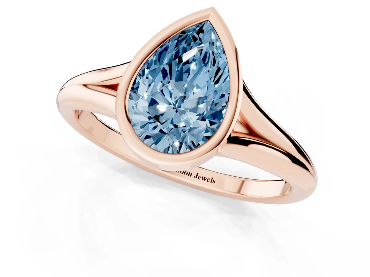 Fancy Blue Bezel Set Pear Cut Cut Solitaire Ring with Tapered Band Rose gold