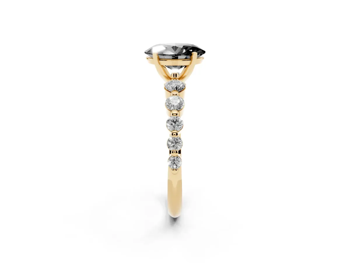 Fancy Black Oval Cut Solitaire Diamond Ring with Pave Band and Four-Prong Setting Yellow gold