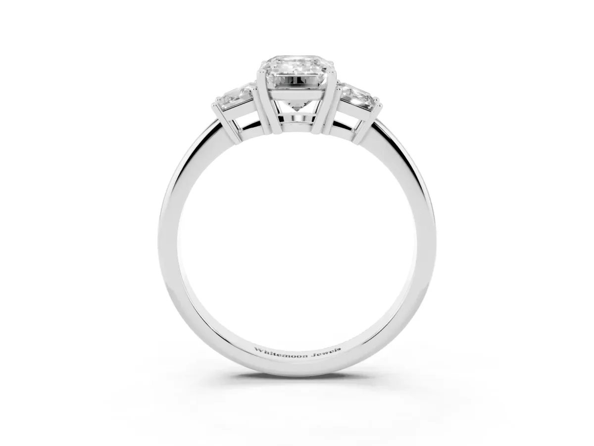 Emerald Cut Diamond Three-Stone Ring with Trapezoid Side Stones and Prong Setting Silver