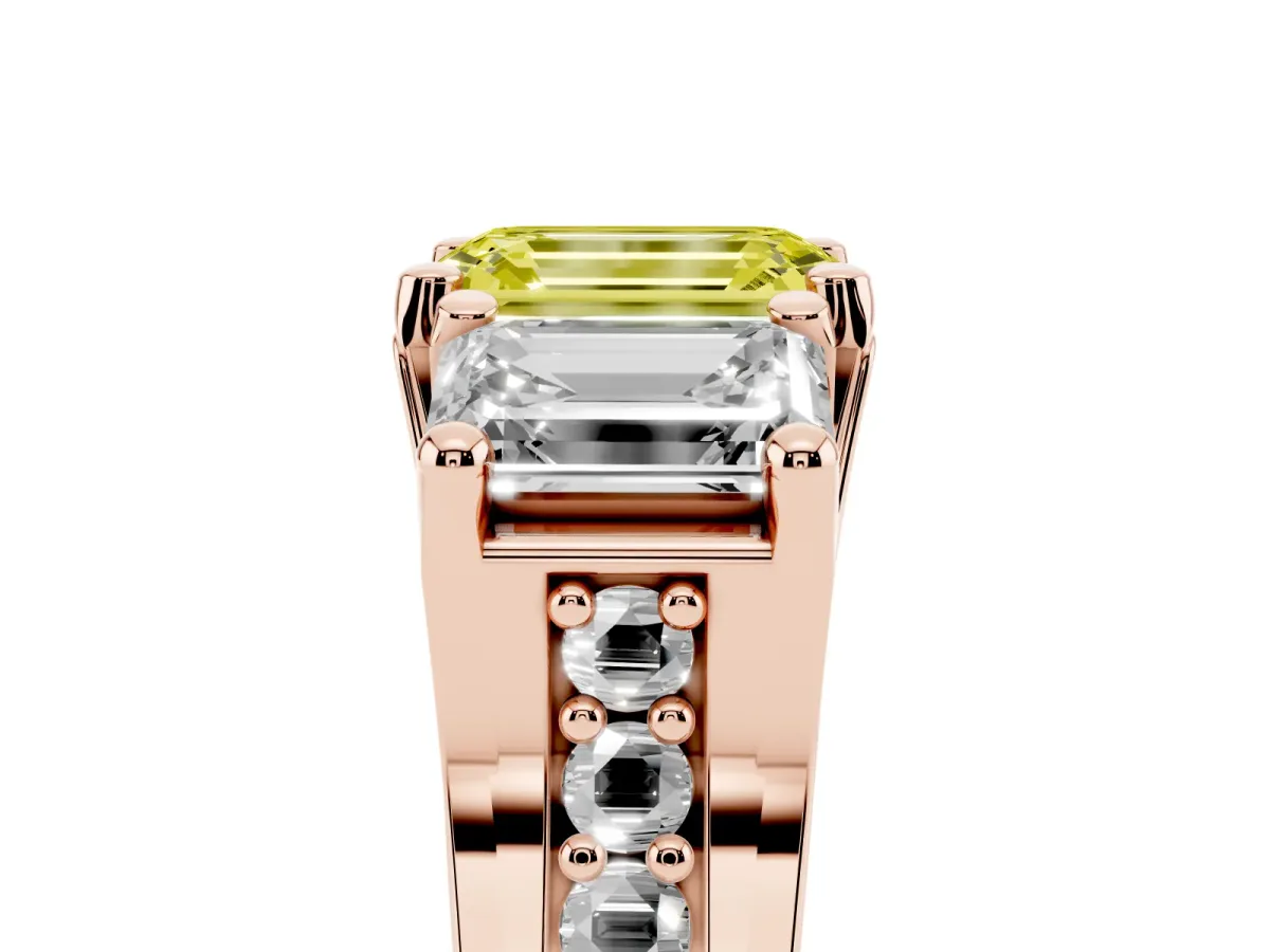 Fancy Yellow Emerald Cut Diamond Three-Stone Ring with Channel Set Band and Four-Prong Setting Rose gold