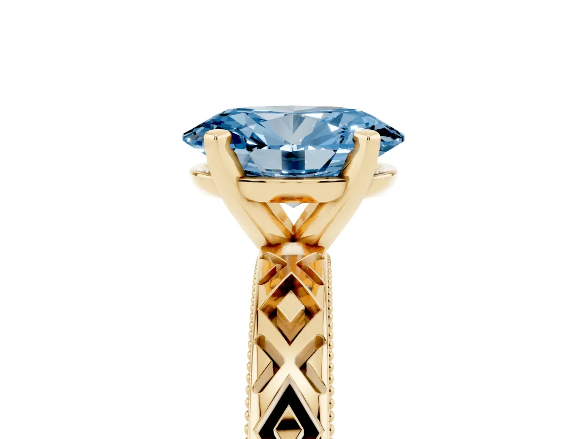 Fancy Blue Oval Cut Solitaire Diamond Ring with Milgrain and Black Enamel X Pattern Band Yellow gold