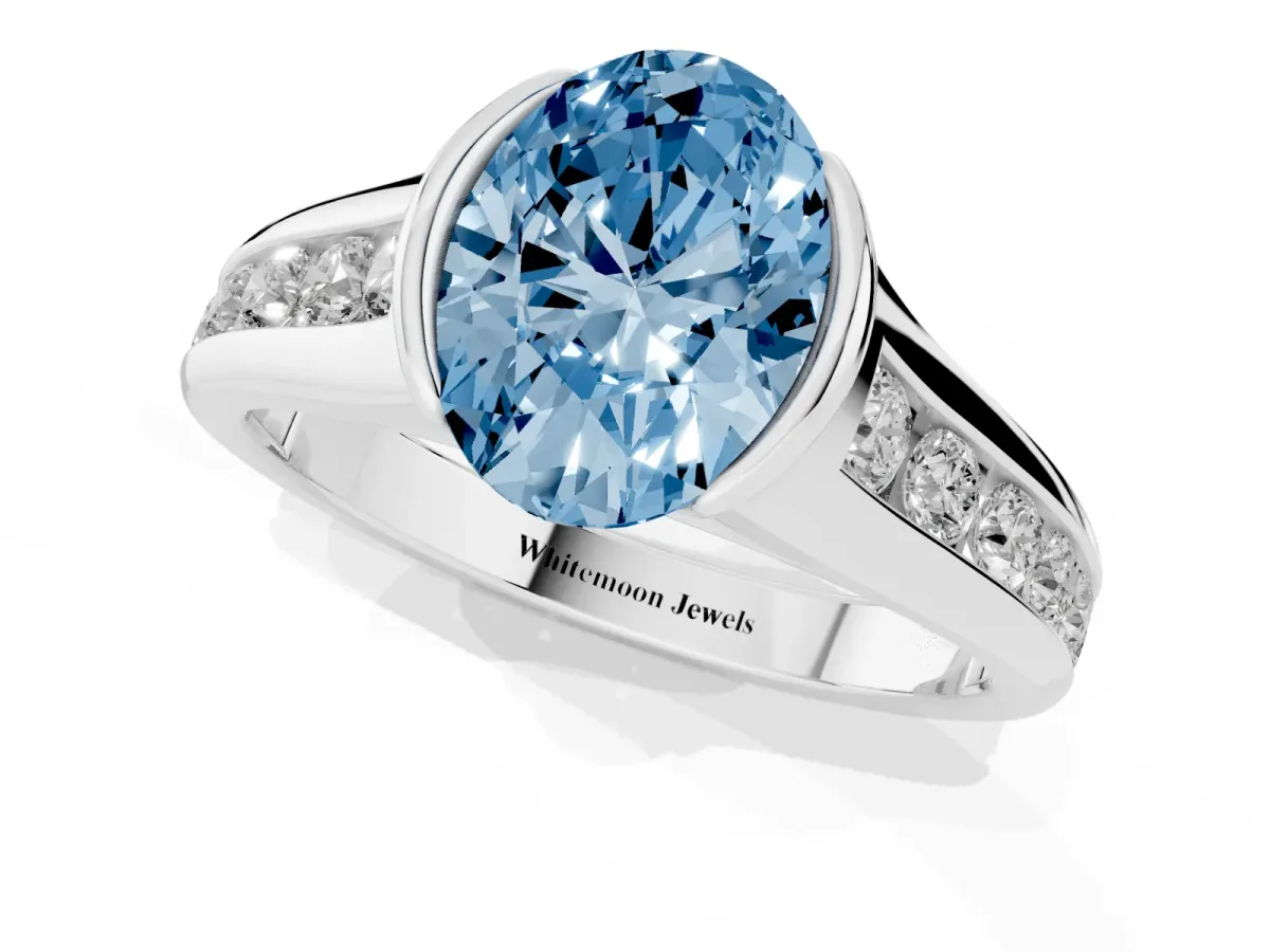 Fancy Blue Oval Cut Solitaire Bezel-Set Diamond Ring with Channel-Set Band Platinum