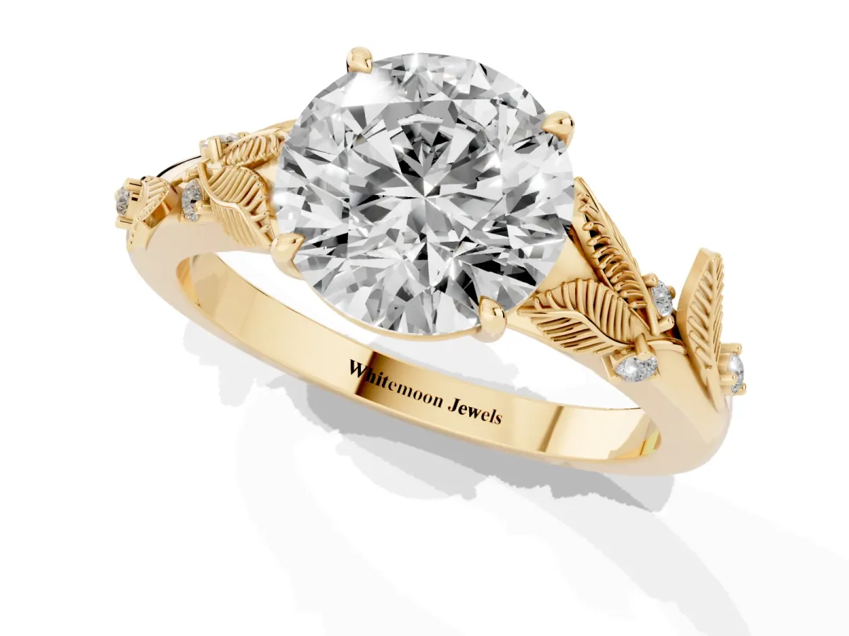 Round Cut Diamond Solitaire Ring with Leaf Motif Band and Four-Prong Setting Yellow gold