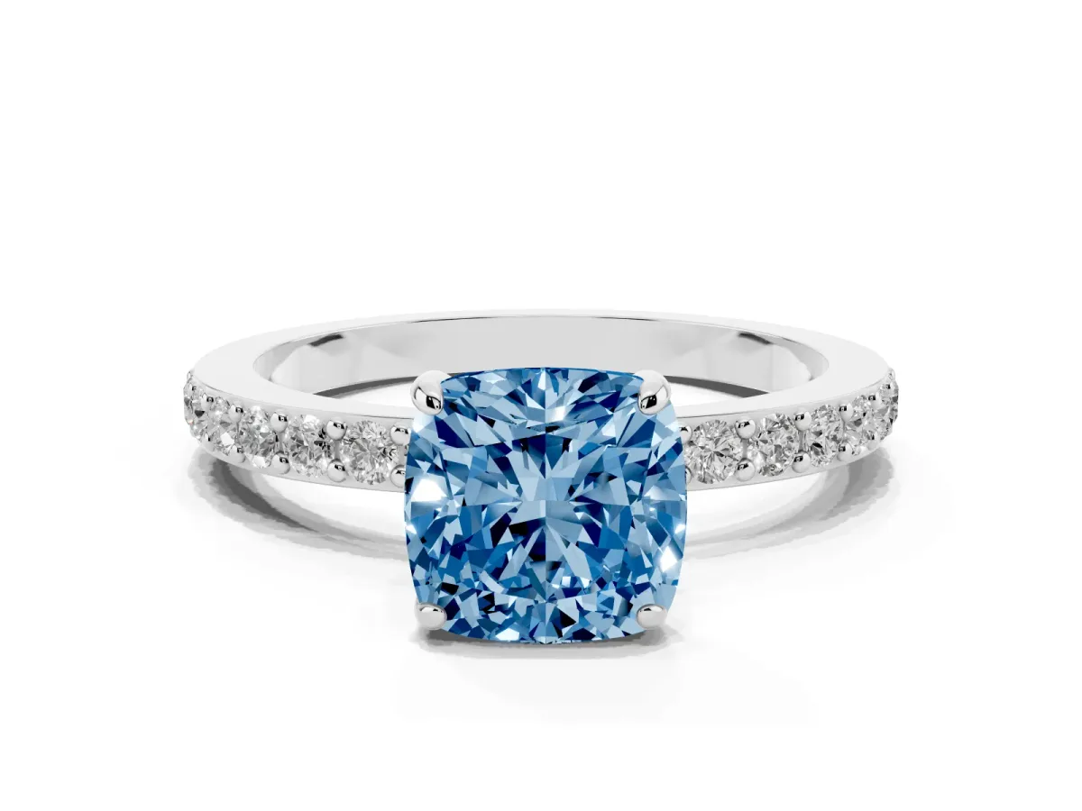 Fancy Blue Cushion Cut Diamond Solitaire Engagement Ring with Pavé Band and Four-Prong Setting Silver