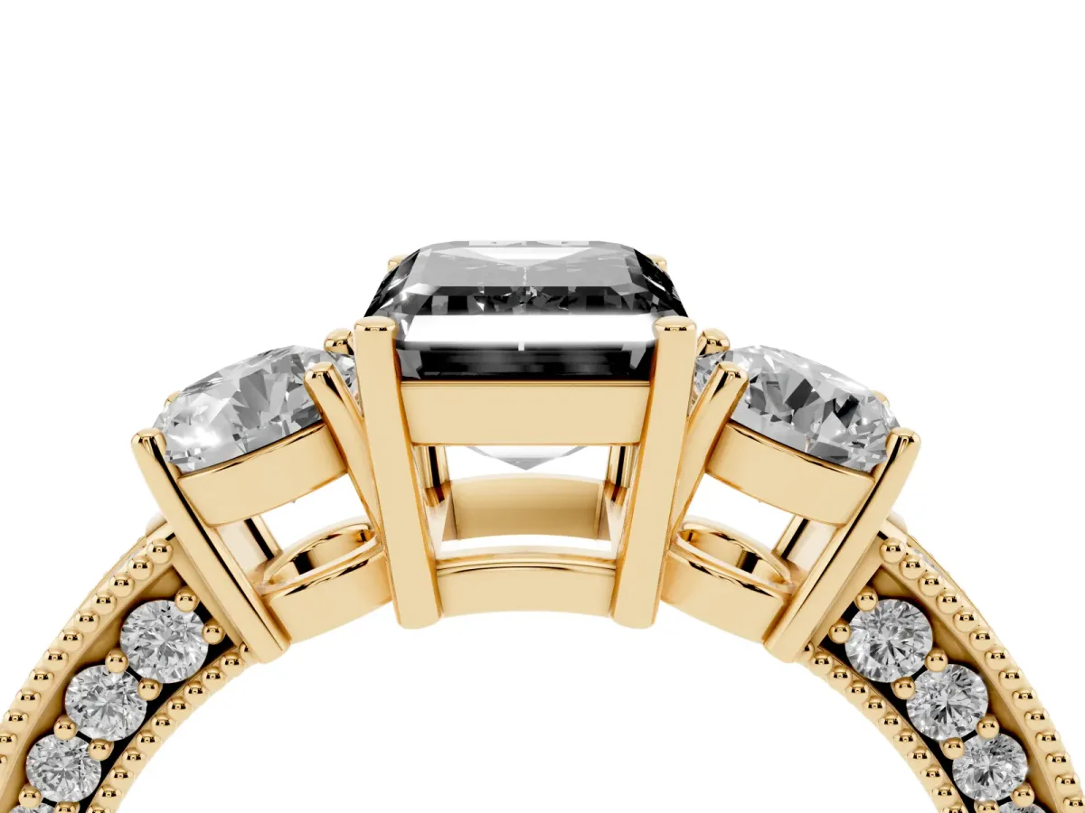 Fancy Black Emerald Cut Three-Stone Diamond Ring with Pavé Band and Four-Prong Setting Yellow gold