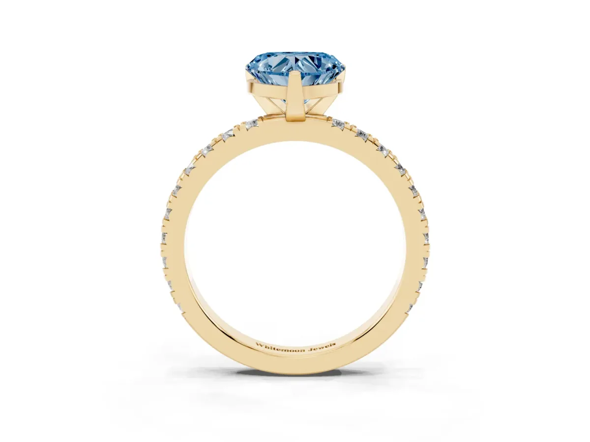 Fancy Blue Heart Cut Diamond Pavé Band Solitaire with Four-Prong Setting Yellow gold