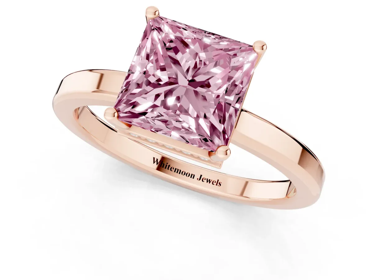 Fancy Pink Princess Cut Cut Solitaire Engagement Ring with Four-Prong Setting on a Classic Band Rose gold