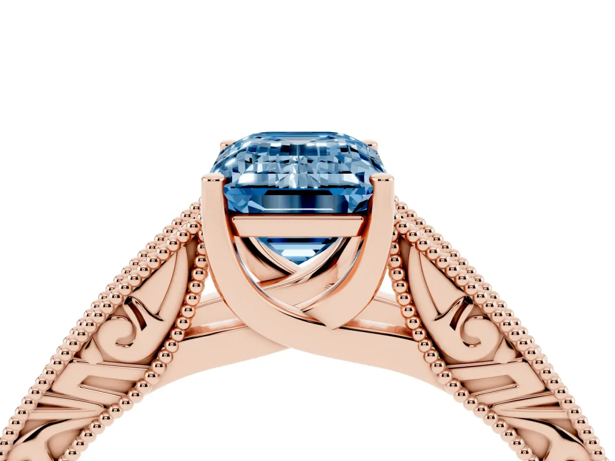 Fancy Blue Emerald Cut Diamond Solitaire Ring with Engraved Band and Four-Prong Setting Rose gold