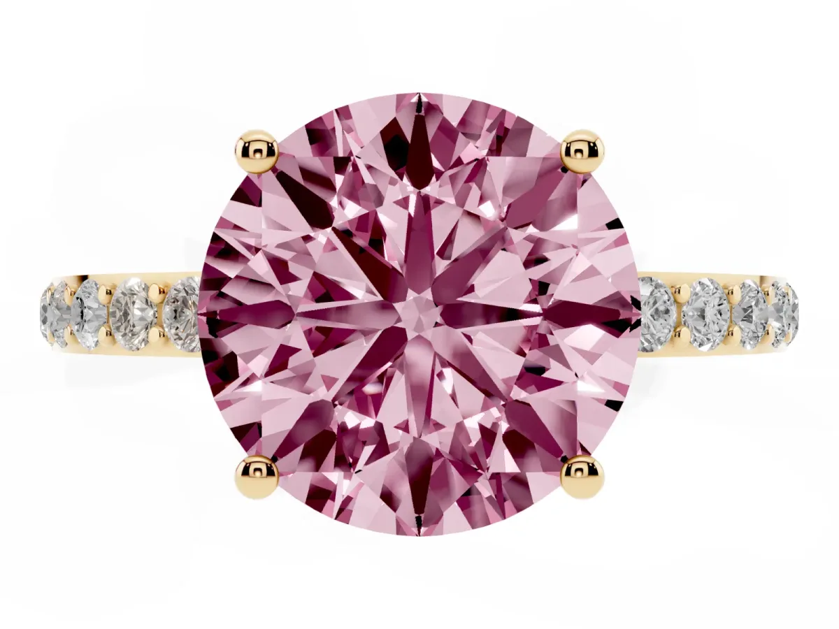 Fancy Pink Round Cut Diamond Solitaire Ring with Round Pavé Shoulders and Prong Setting Yellow gold