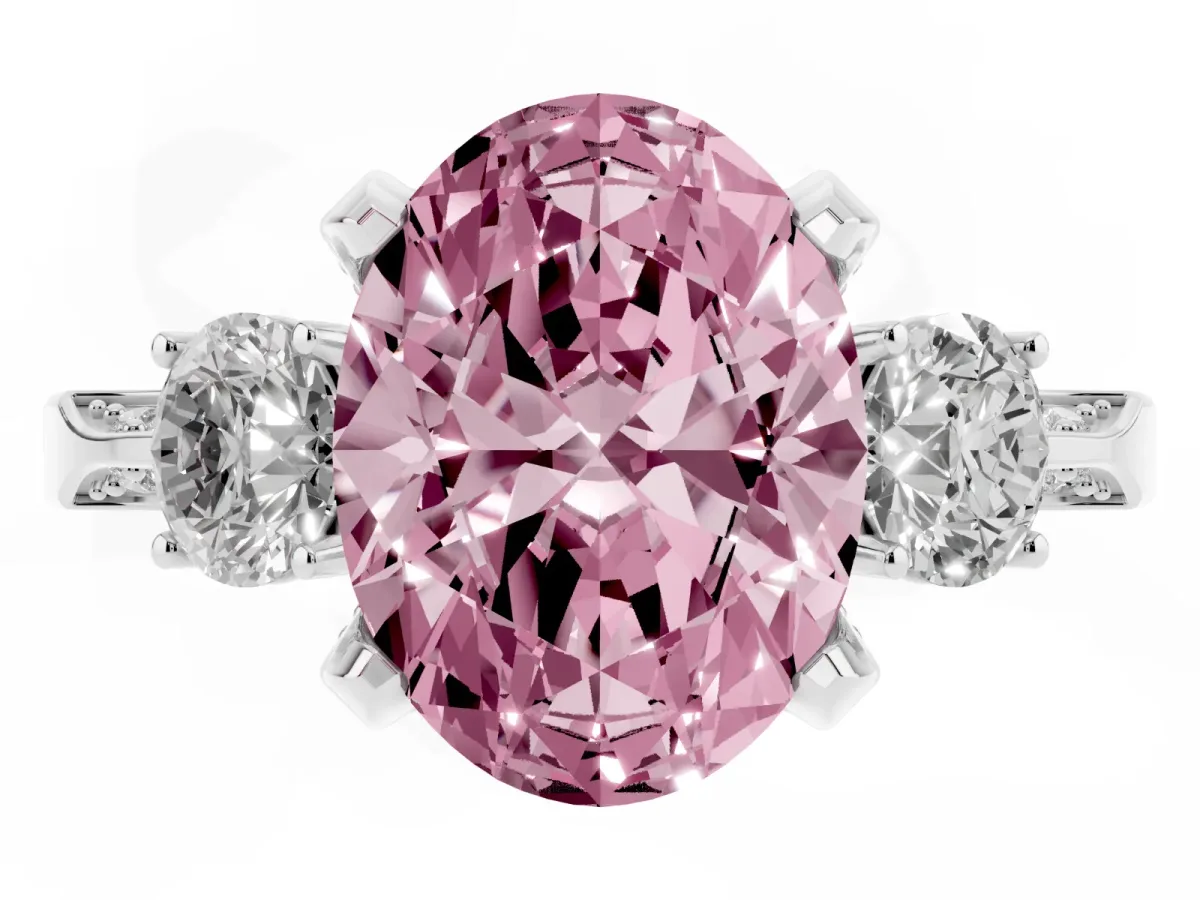 Fancy Pink Oval Cut Brilliant Three-Stone Diamond Ring with Pavé Band and Four-Prong Setting Platinum