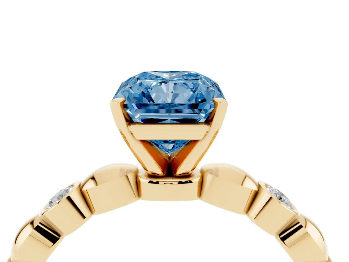 Fancy Blue Radiant Cut Solitaire Bezel-Set Diamond Ring with Beaded Band and Four-Prong Setting Yellow gold