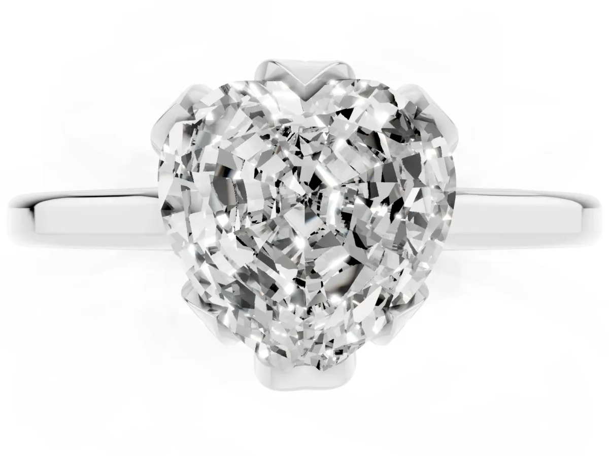 Heart Cut Diamond Solitaire Ring with Flower Prong Setting and Classic Band Silver