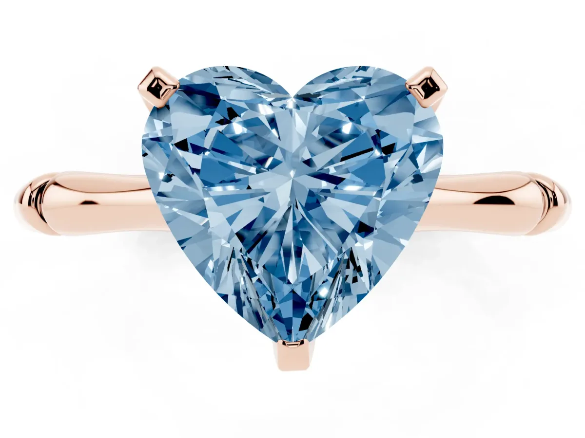 Fancy Blue Heart Cut Solitaire Diamond Ring with Bamboo Band and Four-Prong Setting Rose gold