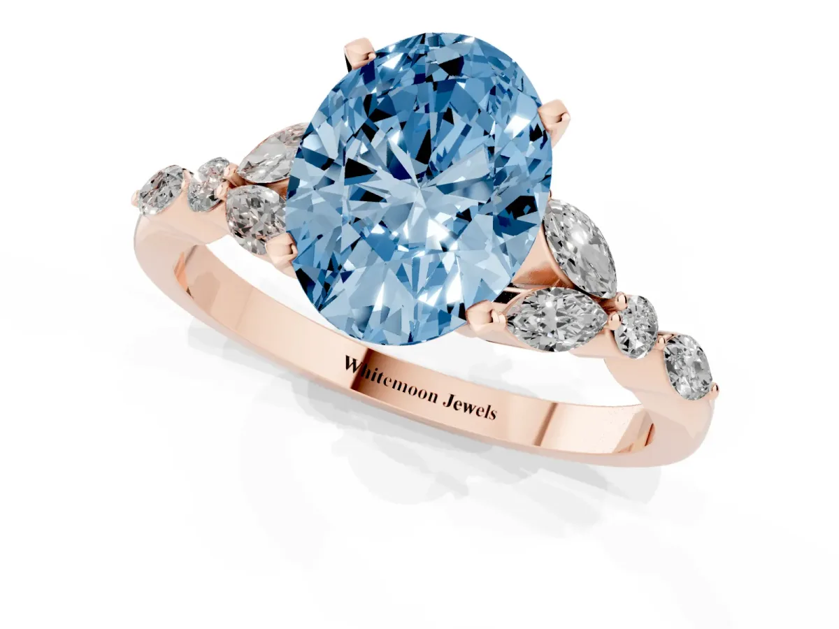 Fancy Blue Oval Cut Diamond Solitaire Ring with Side Stones and Four-Prong Setting Rose gold