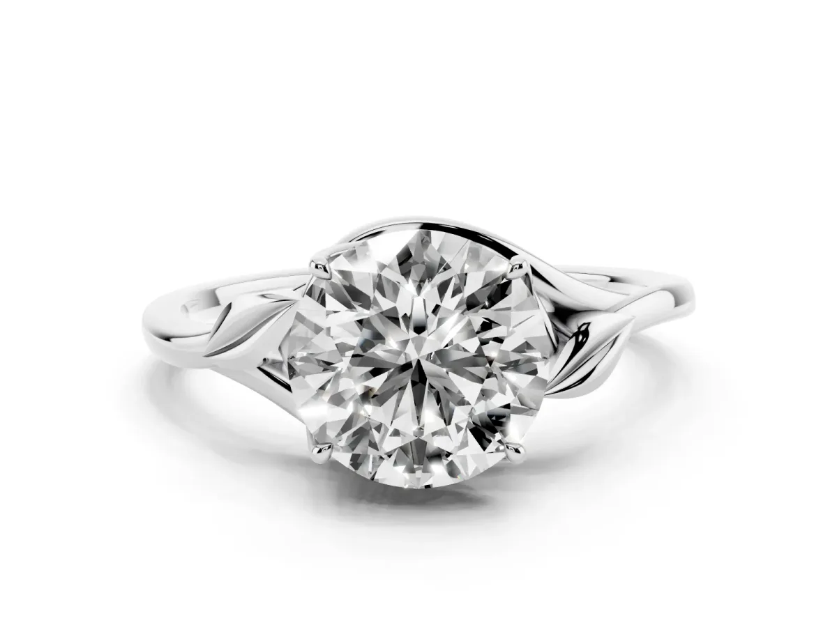 Round Cut Diamond Solitaire Ring with Twist Band and Four-Prong Setting Silver