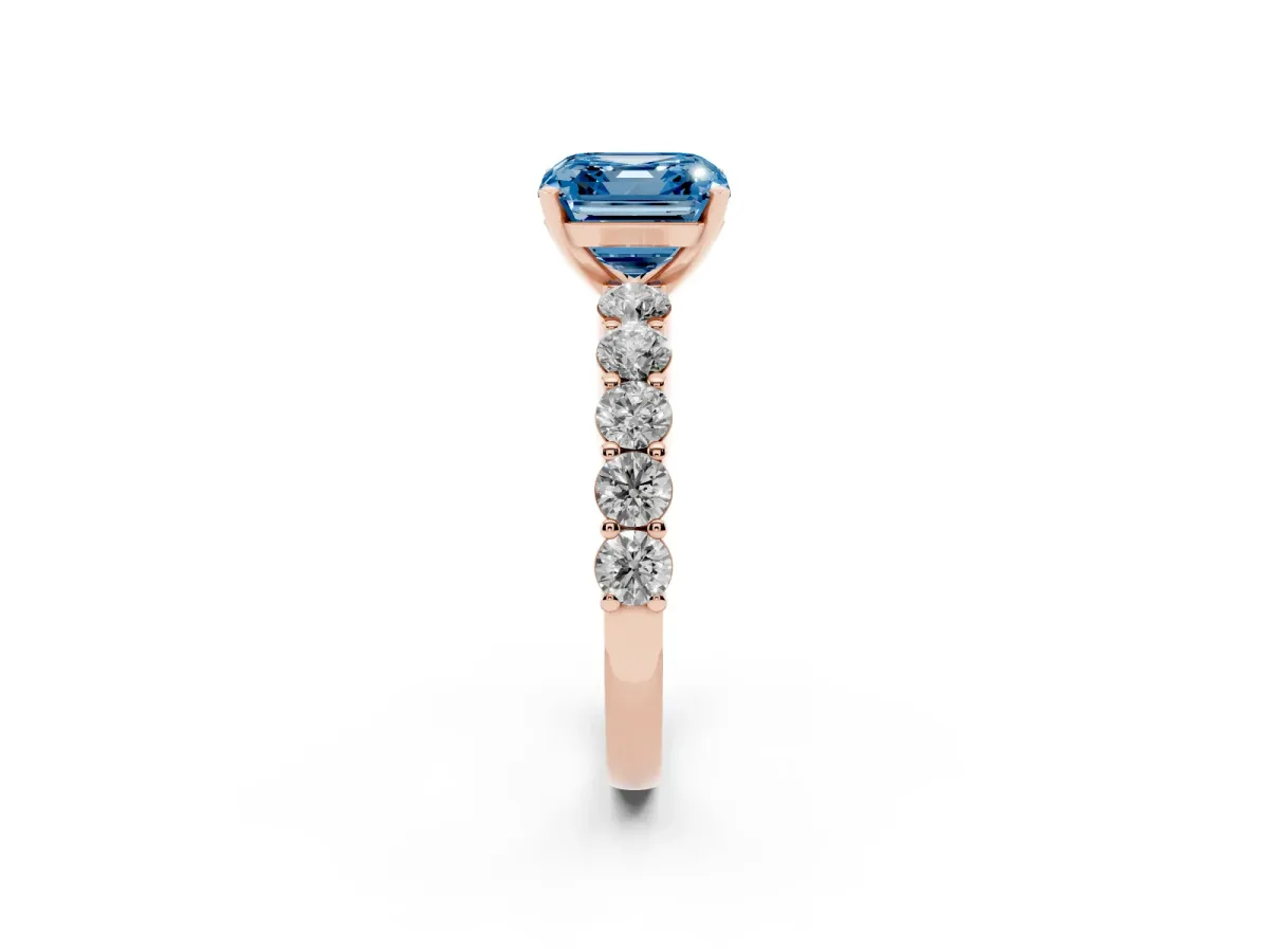 Fancy Blue Asscher Cut Diamond Solitaire Ring with Shared Prong Round Side Stones Rose gold