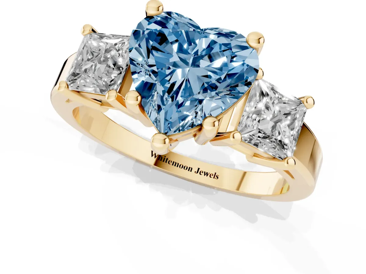 Fancy Blue Three-Stone Heart Cut Cut Solitaire Ring with Prong Setting Yellow gold