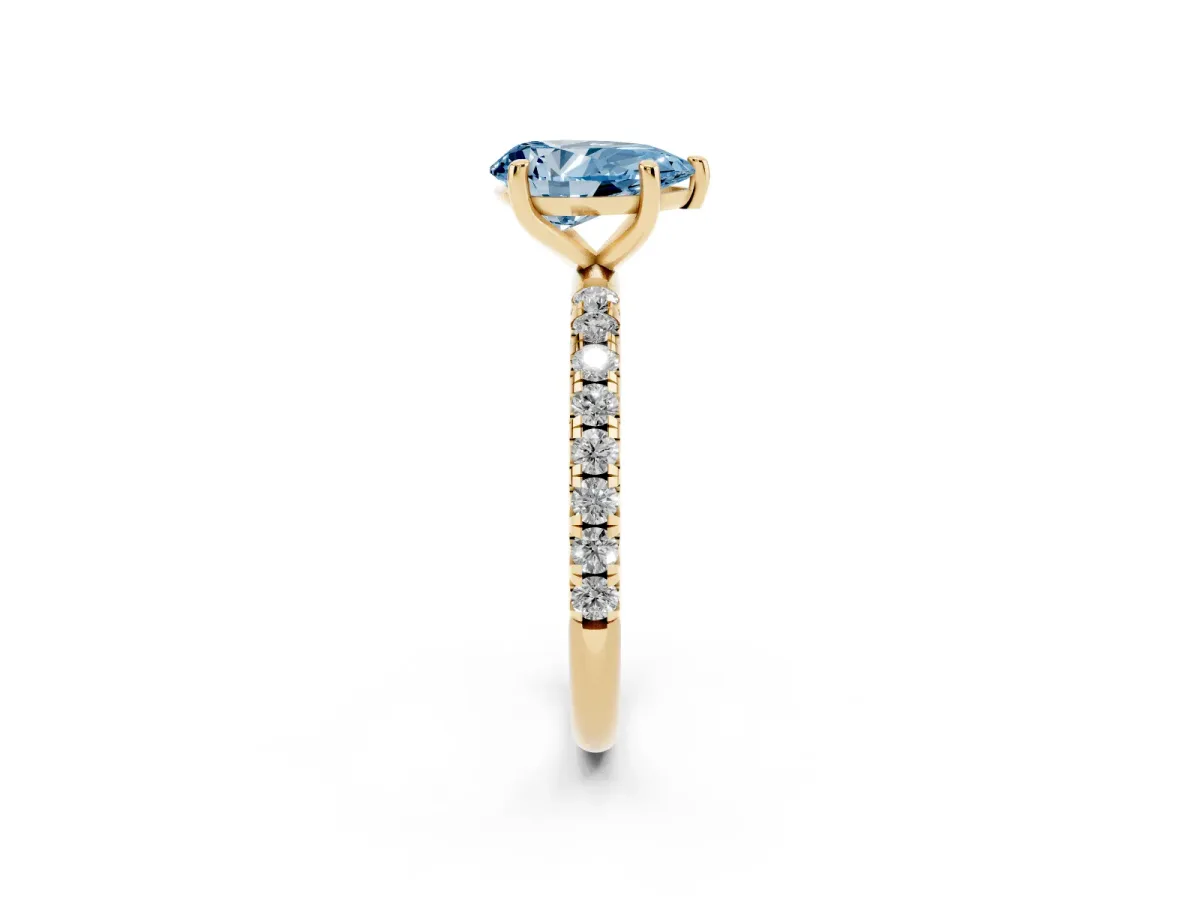 Fancy Blue Pear Cut Cut Diamond Solitaire Ring with Micro Pave Band and Four Prong Setting Yellow gold