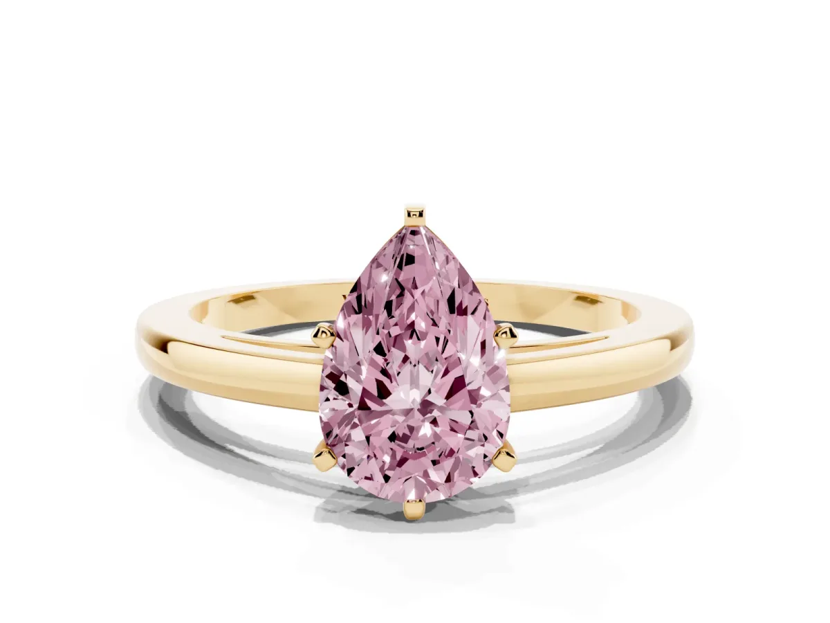Fancy Pink Pear Cut Solitaire Diamond Engagement Ring with Four-Prong Setting on a Classic Band Yellow gold