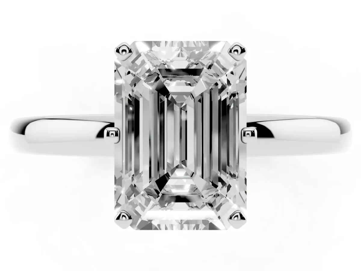 Emerald Cut Solitaire Diamond Ring with Six-Prong Setting on a Classic Band Silver