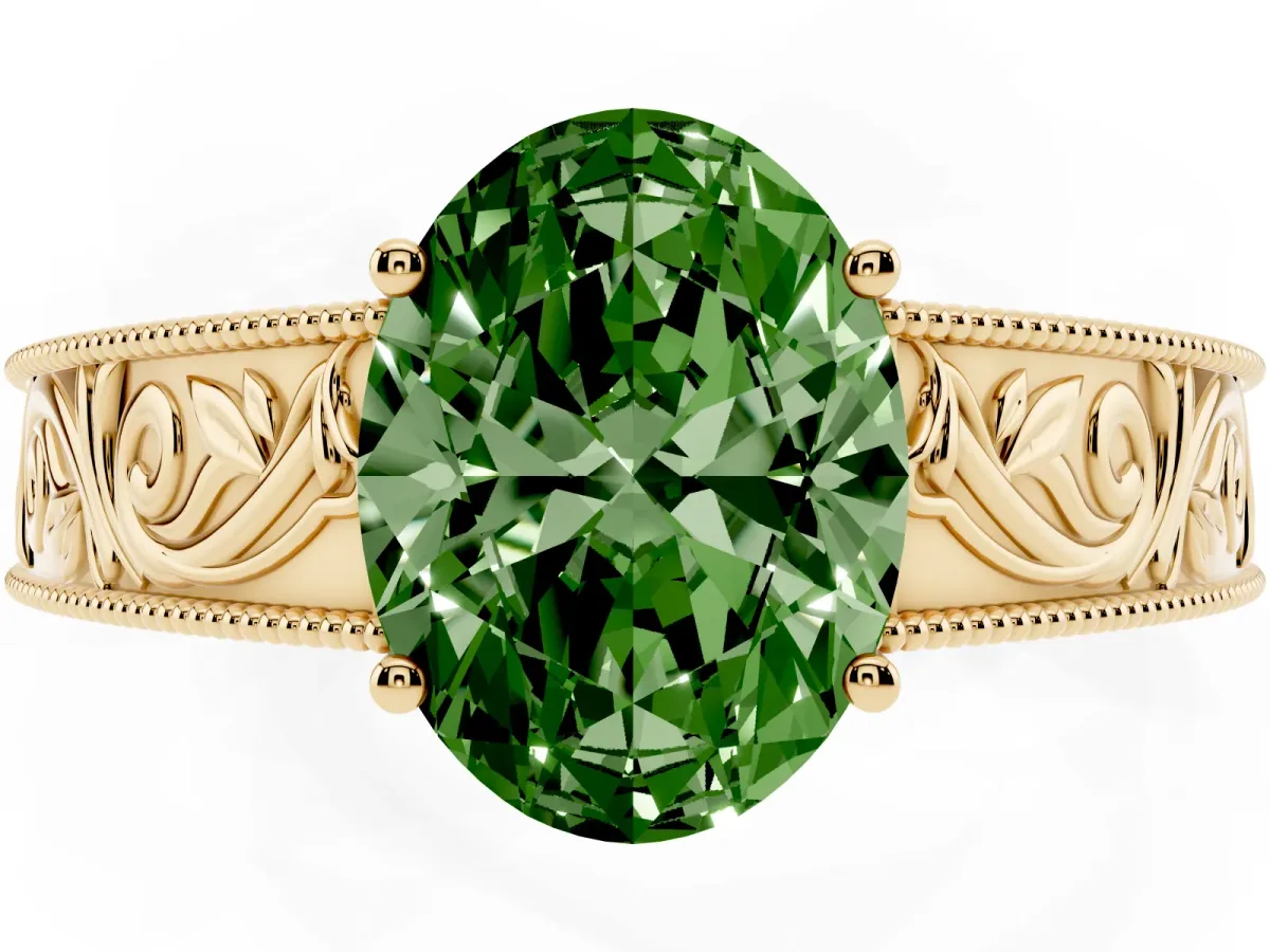 Fancy Green Oval Cut Diamond Solitaire Ring with Engraved Band and Four-Prong Setting Yellow gold
