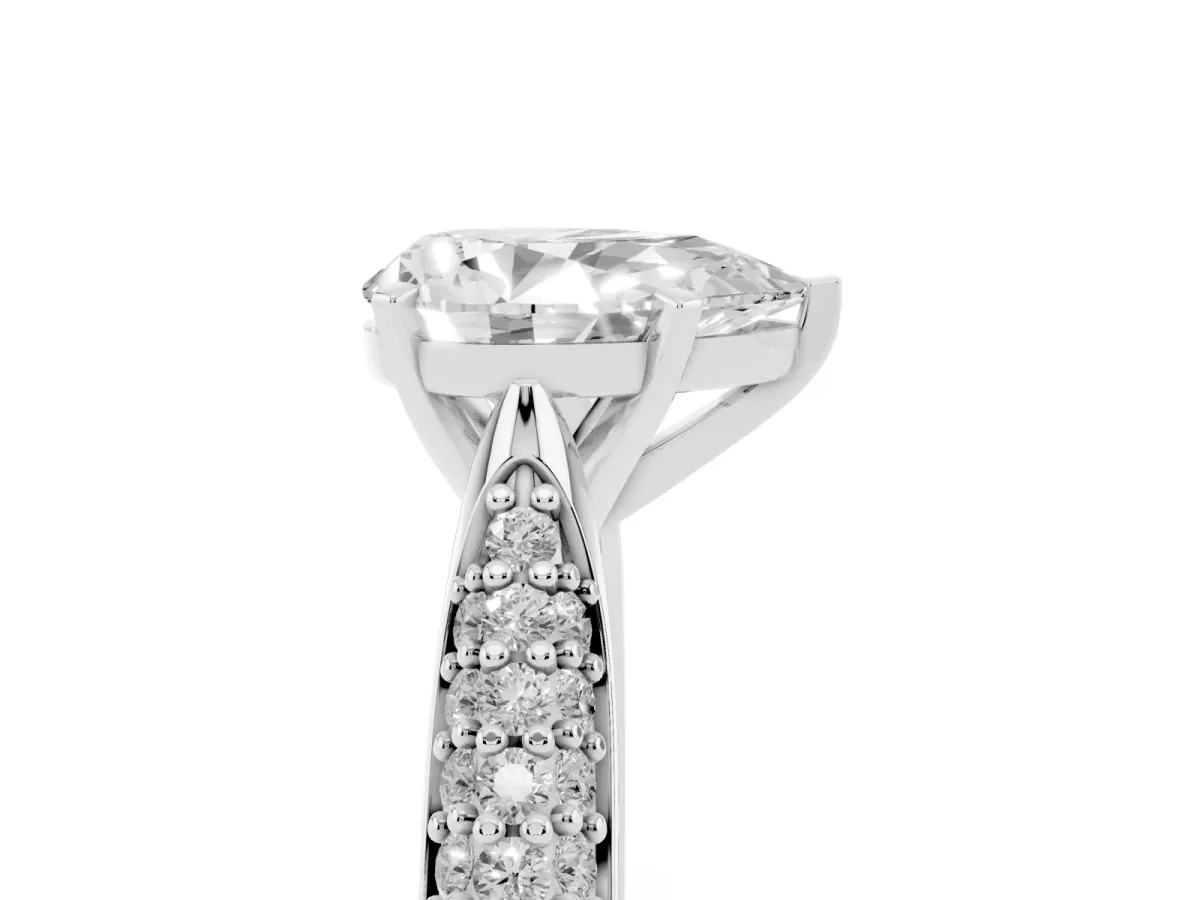 Pear Cut Diamond Solitaire Engagement Ring with Multi-Row Round Pavé Band and Prong Setting Platinum
