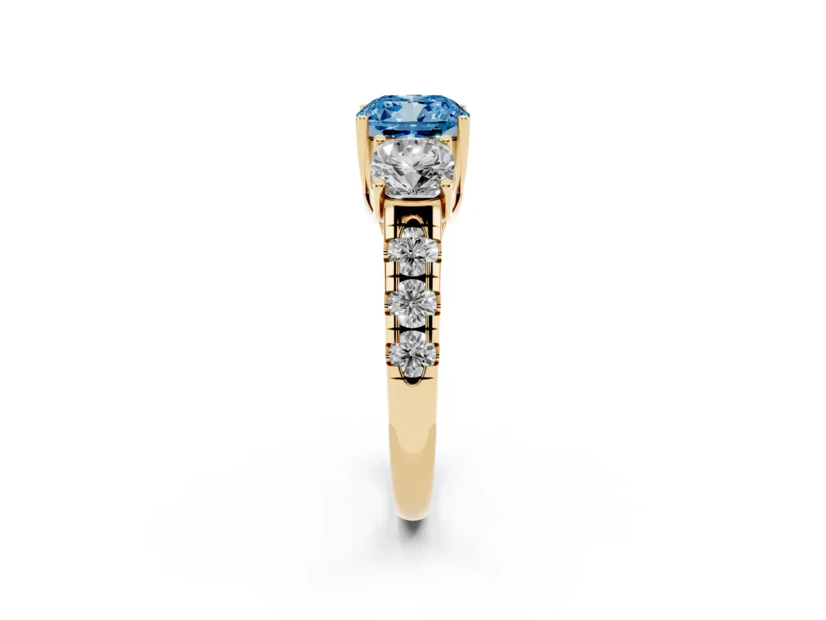 Fancy Blue Three-Stone Cushion Cut Diamond Pavé Band with Prong Setting Yellow gold