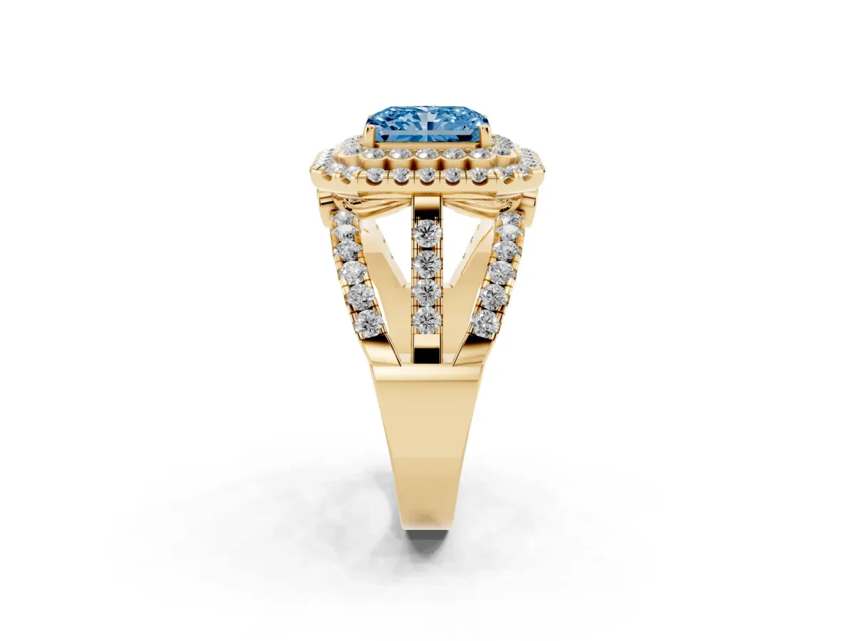 Fancy Blue Radiant Cut Diamond Double Halo Ring with Round Pavé Split Shank and Prong Setting Yellow gold