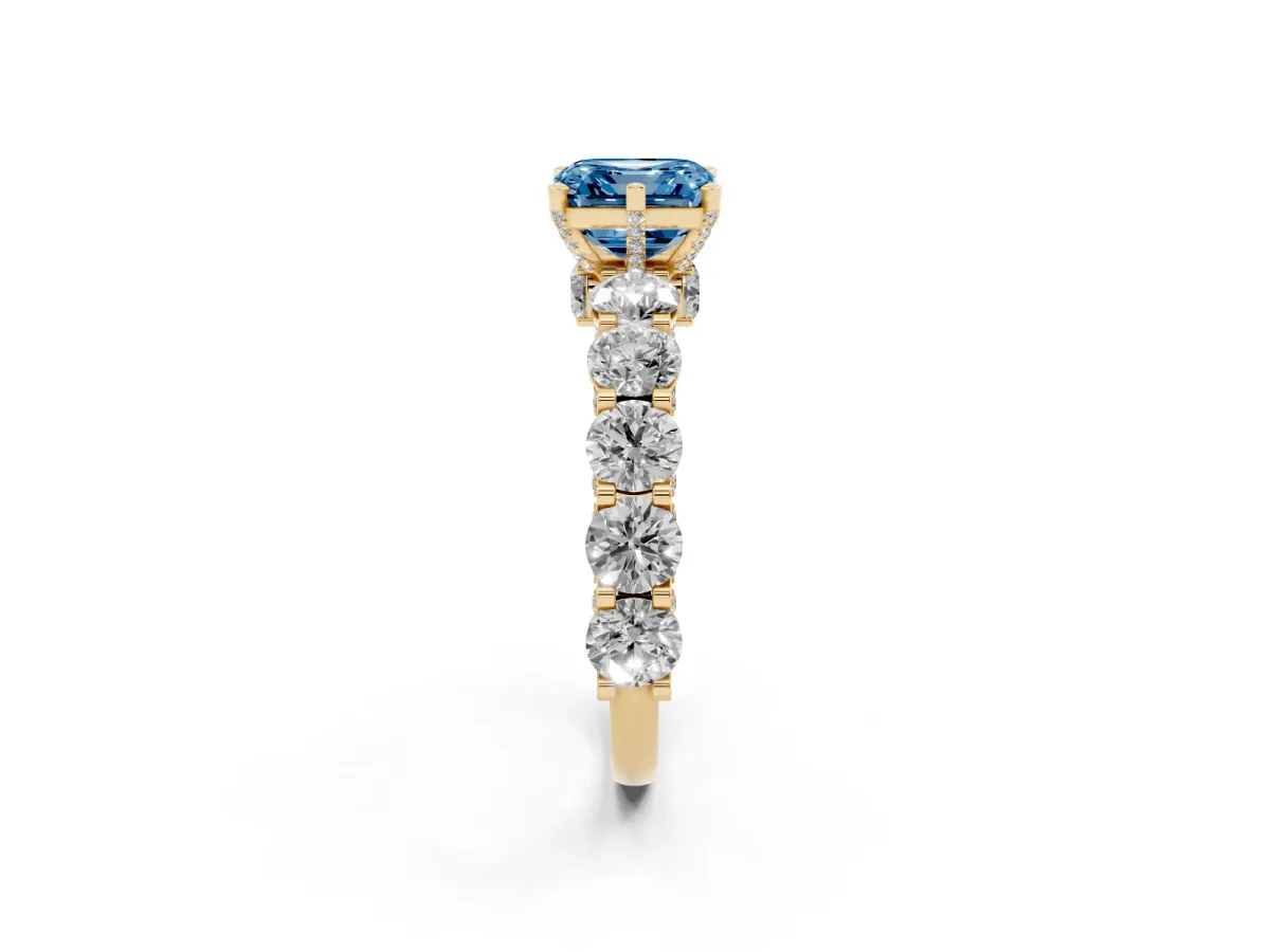 Fancy Blue Asscher Cut Diamond Side Stone Engagement Ring with Four-Prong Setting Yellow gold