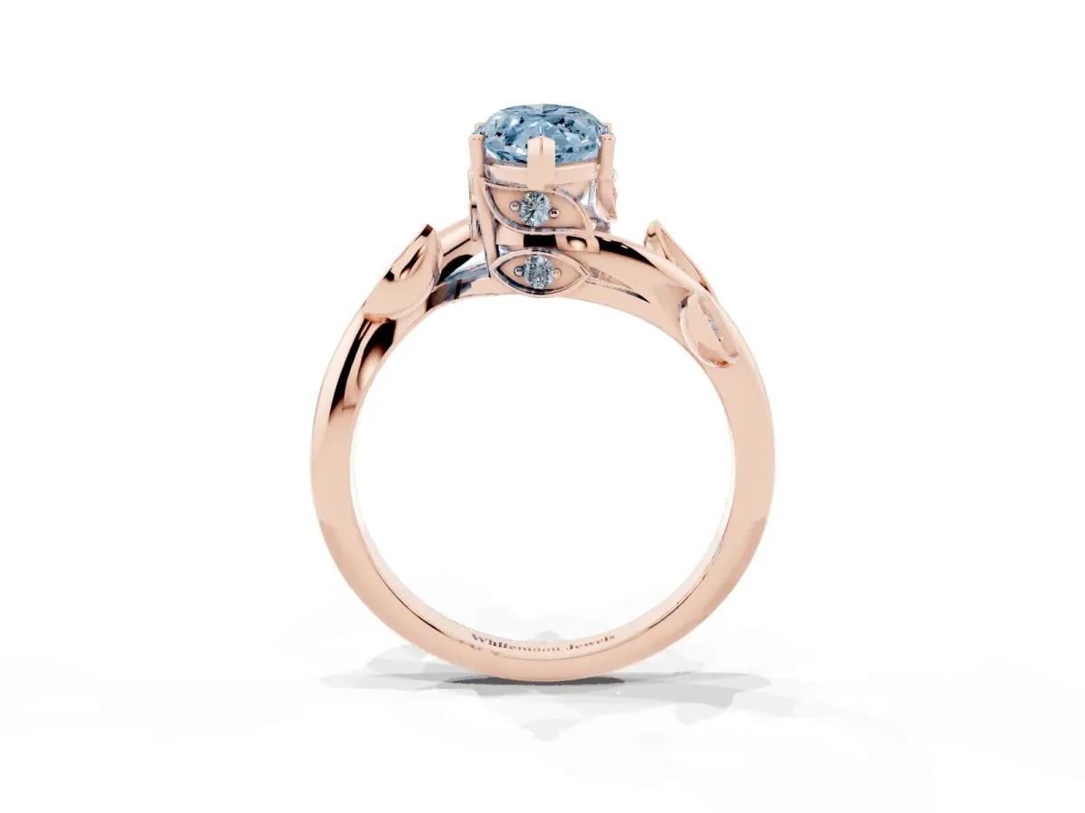 Fancy Blue Marquise Cut Solitaire Twist Engagement Ring with Leaf Accents and Prong Setting Rose gold