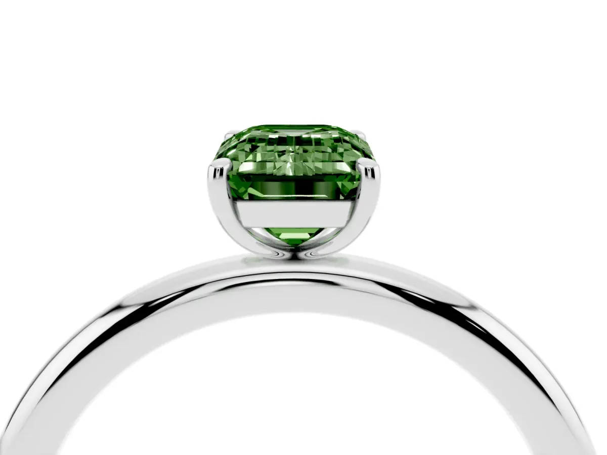 Fancy Green Emerald Cut Solitaire Diamond Ring with Four-Prong Setting on a Plain Band Platinum