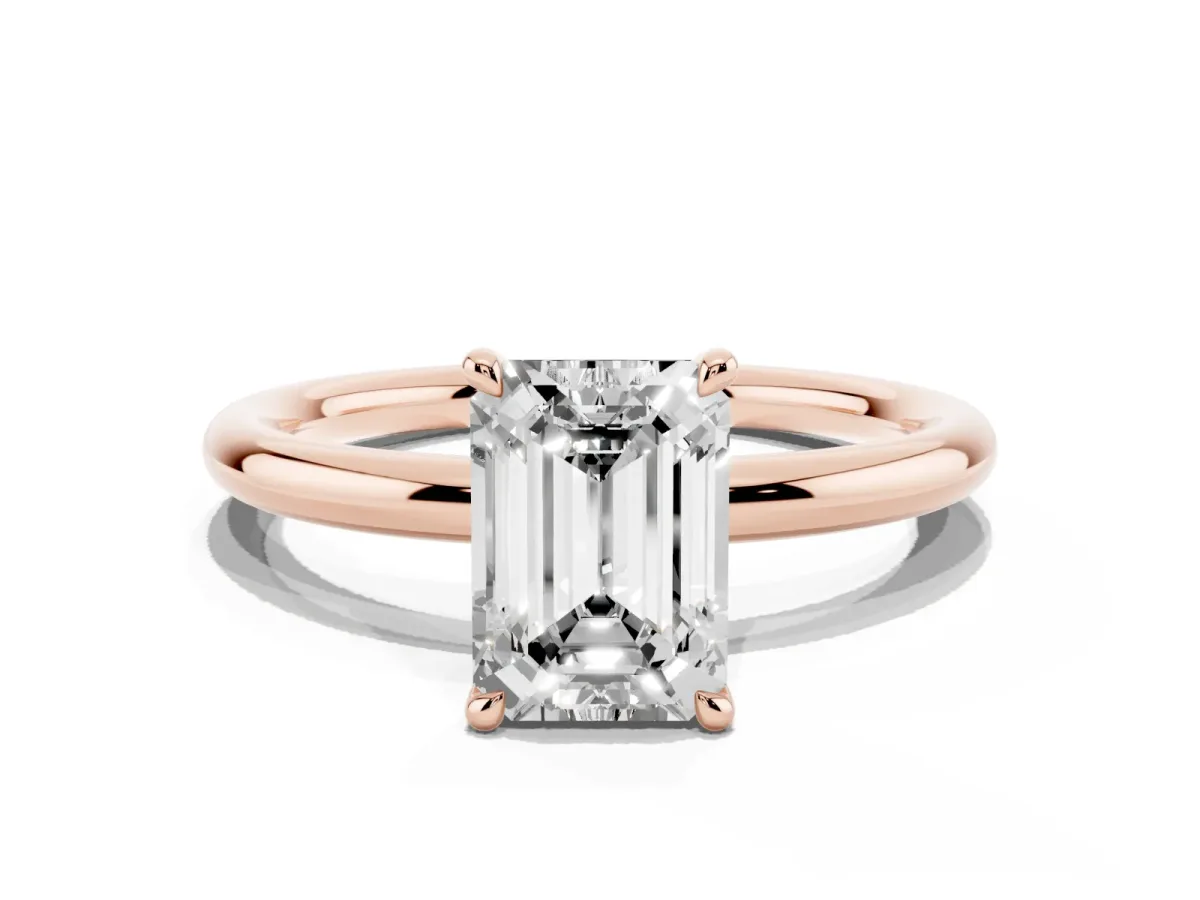 Emerald Cut Diamond Solitaire Ring with Thin Band and Four-Prong Setting Rose gold