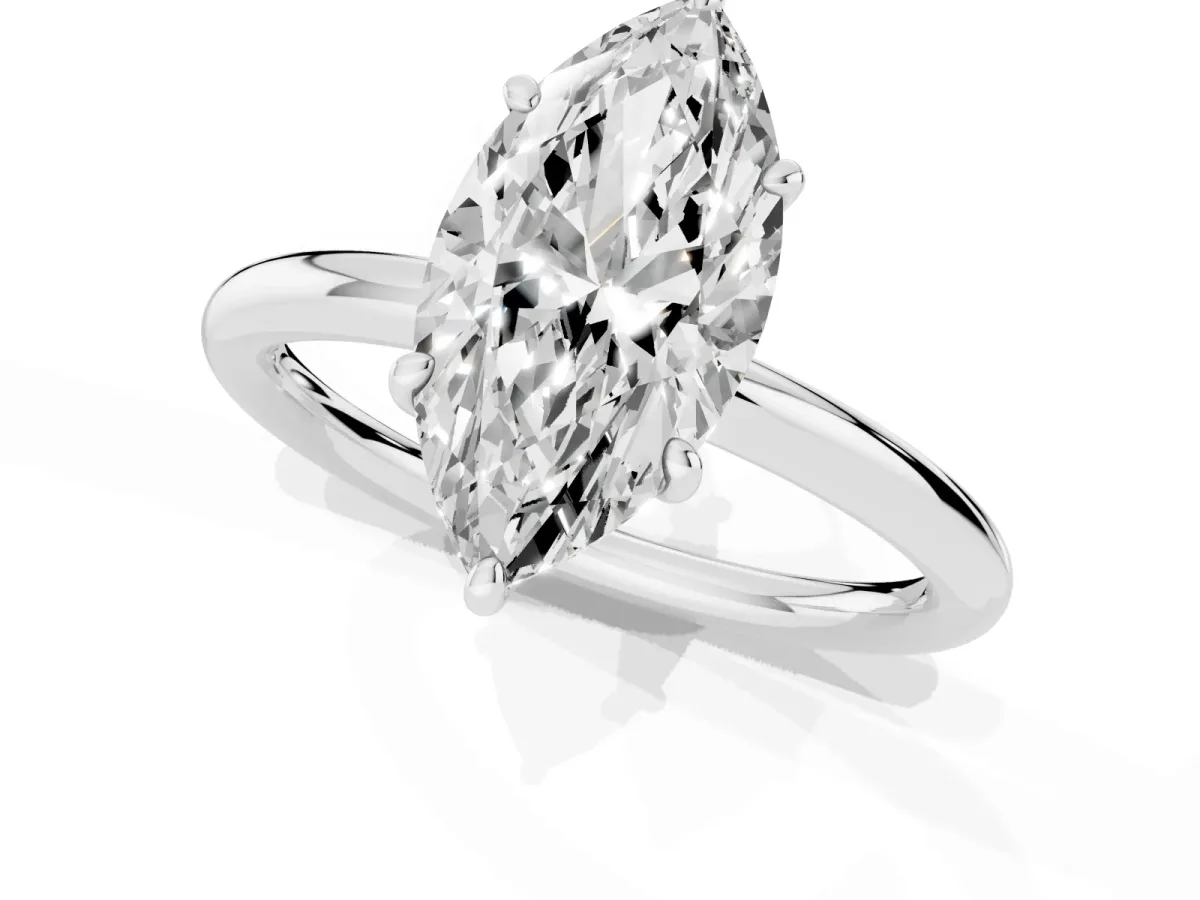Marquise Cut Solitaire Diamond Ring with Four-Prong Setting on a Plain Band Platinum