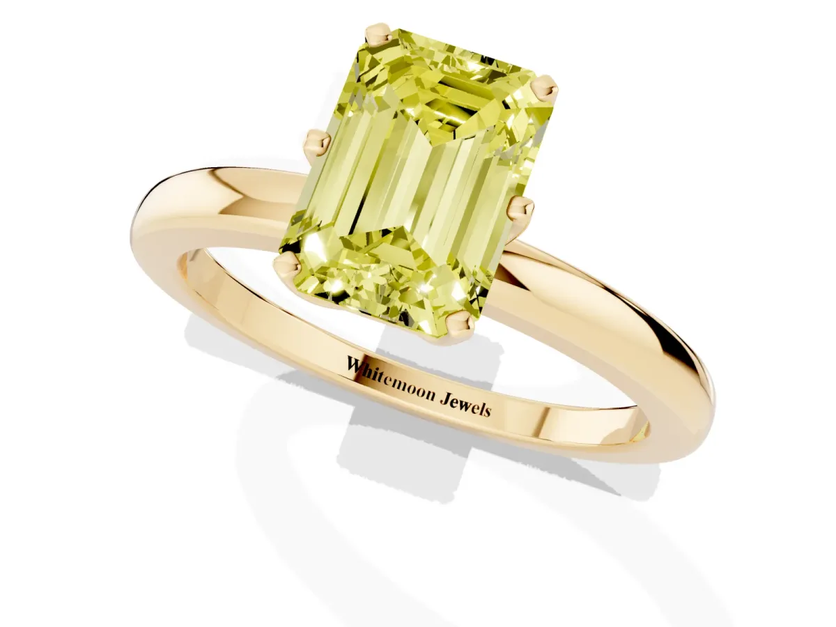 Fancy Yellow Emerald Cut Solitaire Diamond Ring with Six-Prong Setting on a Classic Band Yellow gold