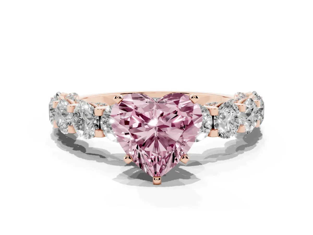 Fancy Pink Heart Cut Diamond Side Stone Engagement Ring with Four-Prong Setting Rose gold