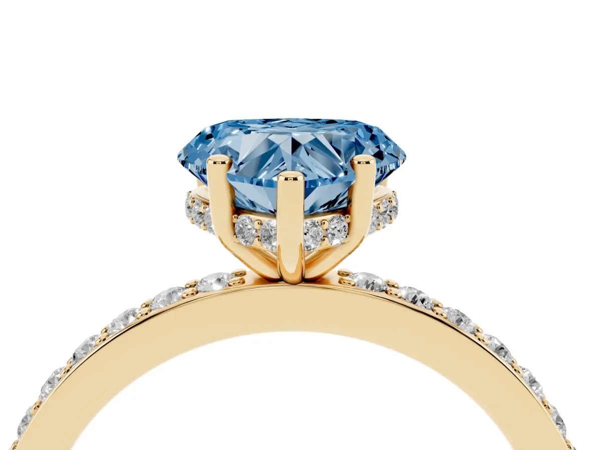 Fancy Blue Heart Cut Cut Diamond Pavé Band Ring with Four-Prong Setting Yellow gold