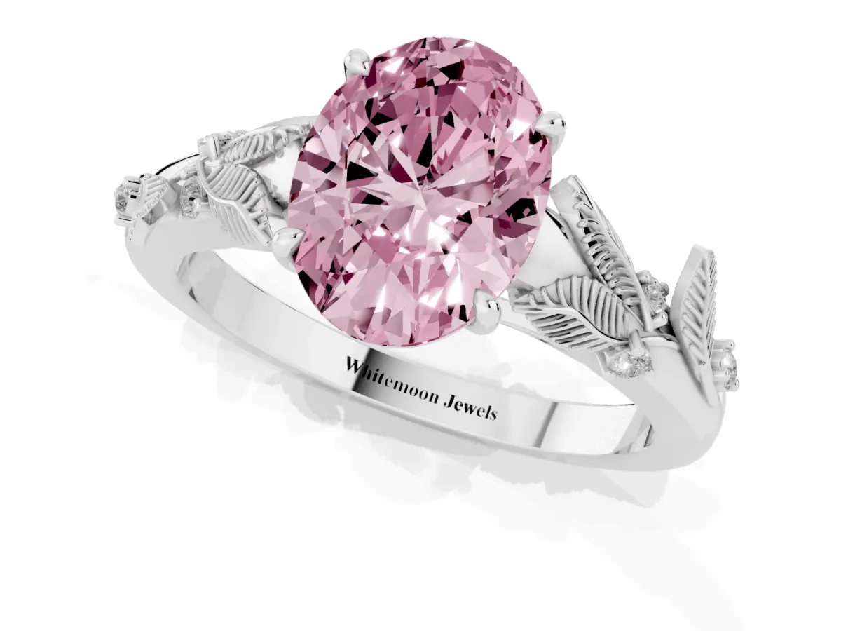 Fancy Pink Oval Cut Diamond Solitaire Ring with Leaf Motif Band and Four-Prong Setting Silver